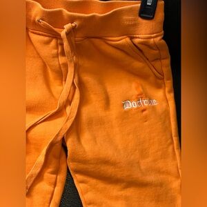 Orange Joggers with Embroidered Logo stack pants